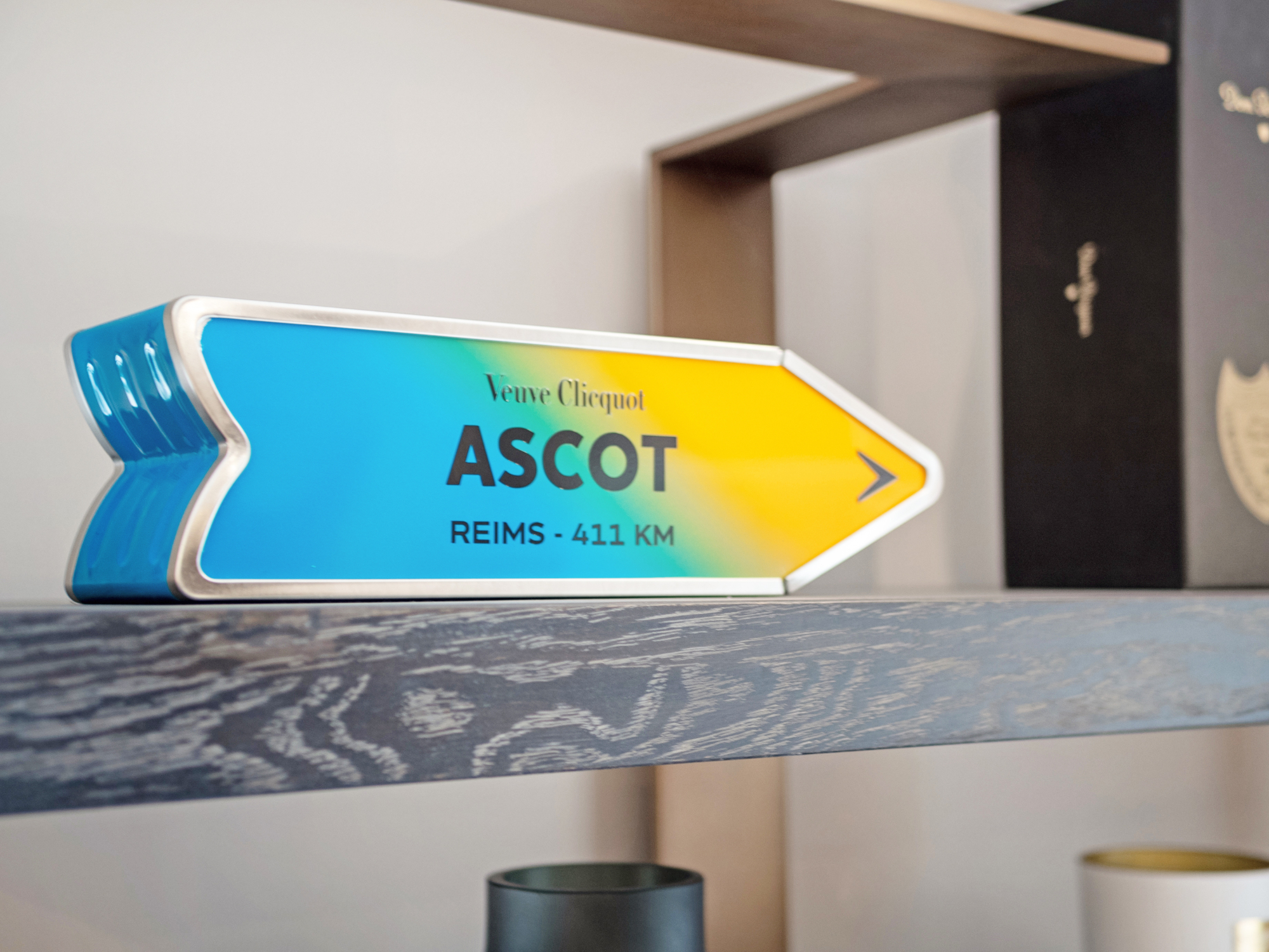 Ascot sign on a display tin on a shelf